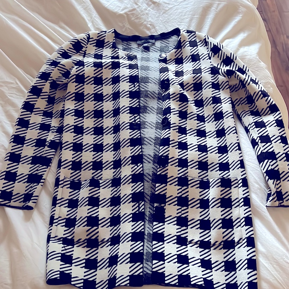 Black and white cardigan in size XS small. It has a nice weight to it.
